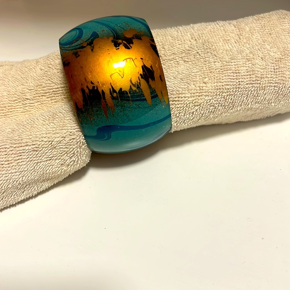 Bangle bracket with aqua and gold detail